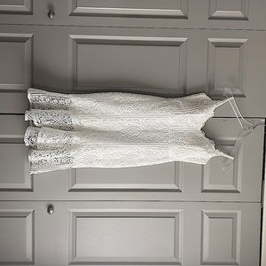 White lace mid-length dress. Only worn once for bridal shower!